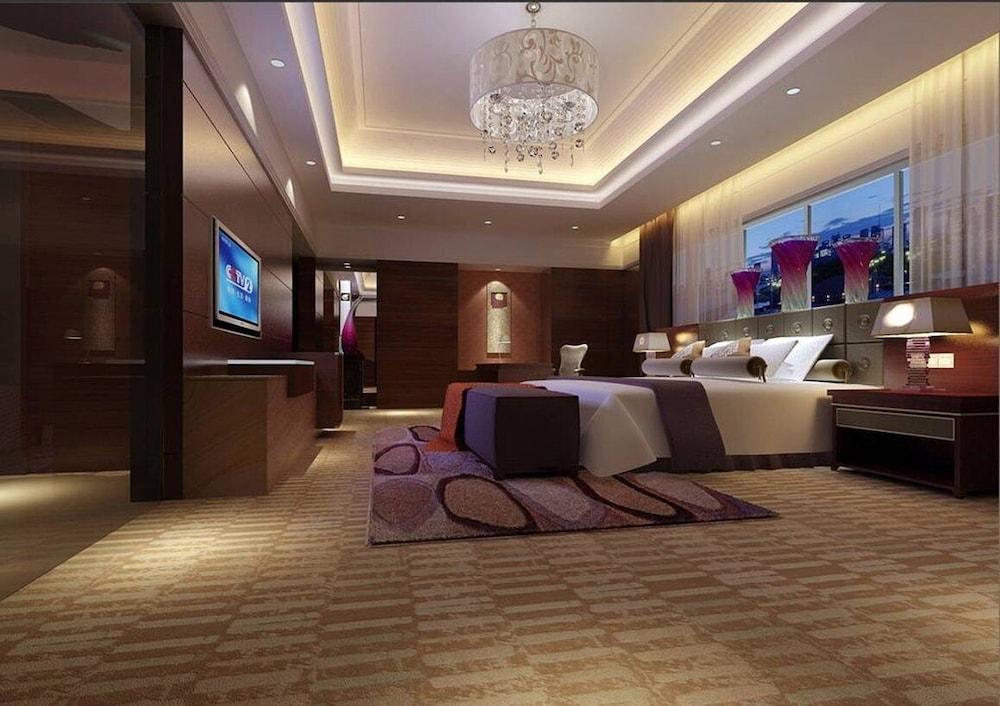 Готель Marco Polo Jin Jiang Цзиньцзян Номер фото